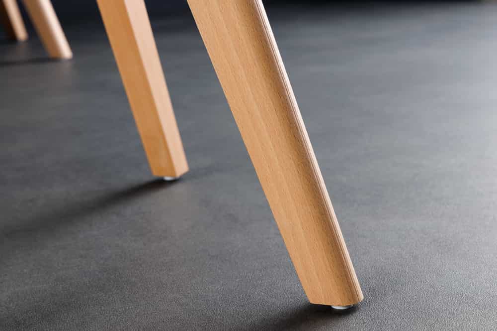 Design Stuhl SCANDINAVIA MEISTERSTÜCK transparent schwarz Kunststoff Buchenholz natur