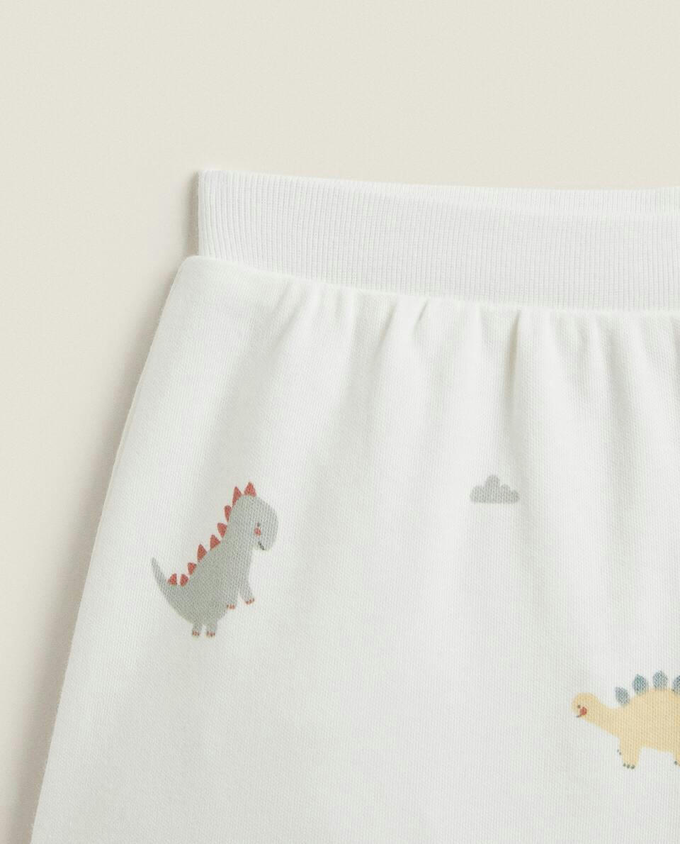 Conjunto de pijama infantil com estampa de dinossauro