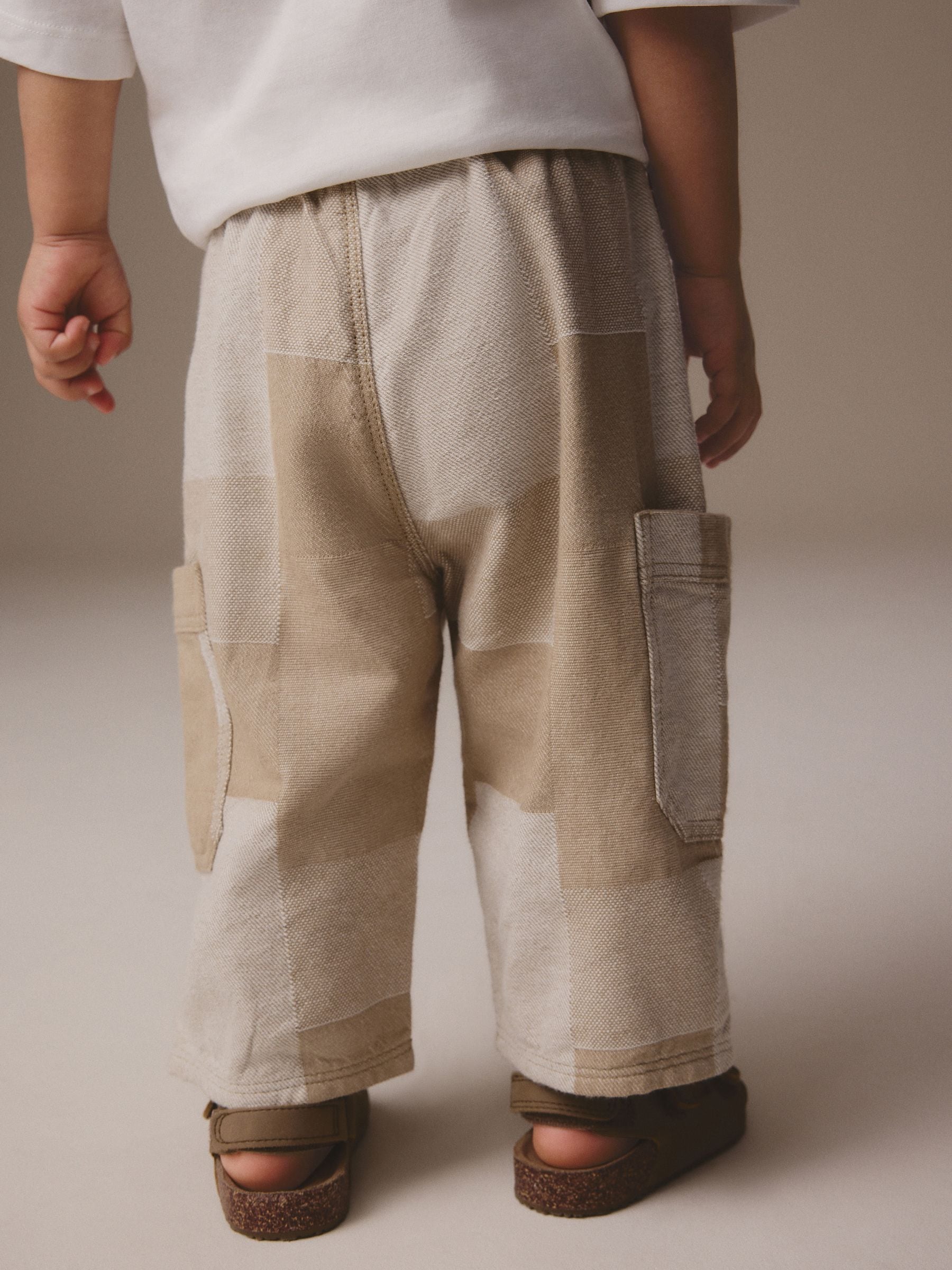 Steenkleurig patchwork - 100% katoenen cargobroek met wijde pijpen en elastische taille (3mnd-7jr)