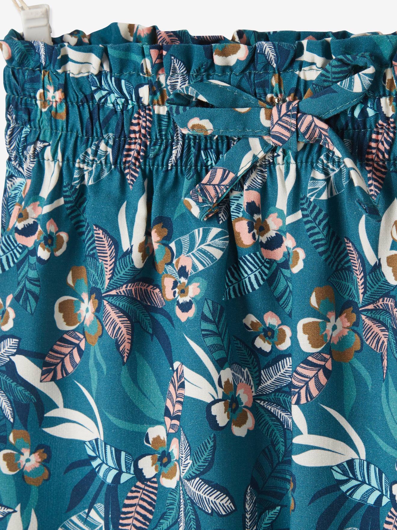 Calças fluidas estampadas para bebês na cor cru.