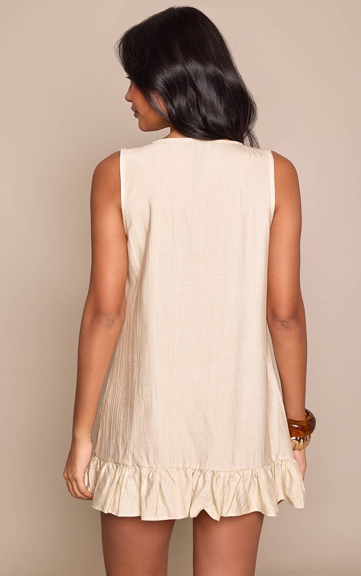 Crème Robe Mini Tissée Texturée À Taille Basse Et Ourlet À Volants