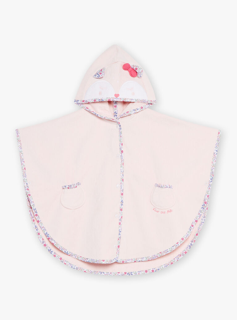 Cape de bain à capuche rose à motif fleuri.