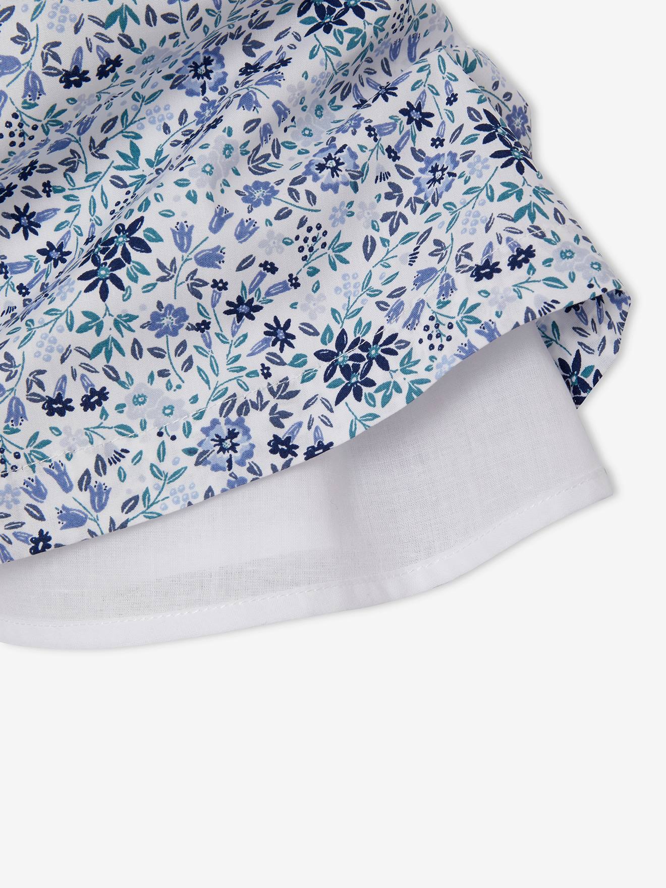 Vestido de festa infantil com estampa floral branca clara