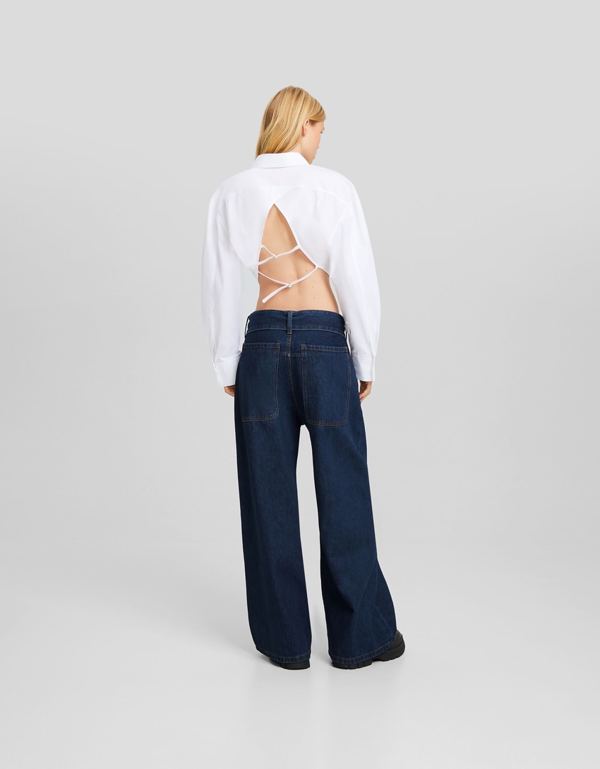 Calça jeans de perna extra larga com cinto