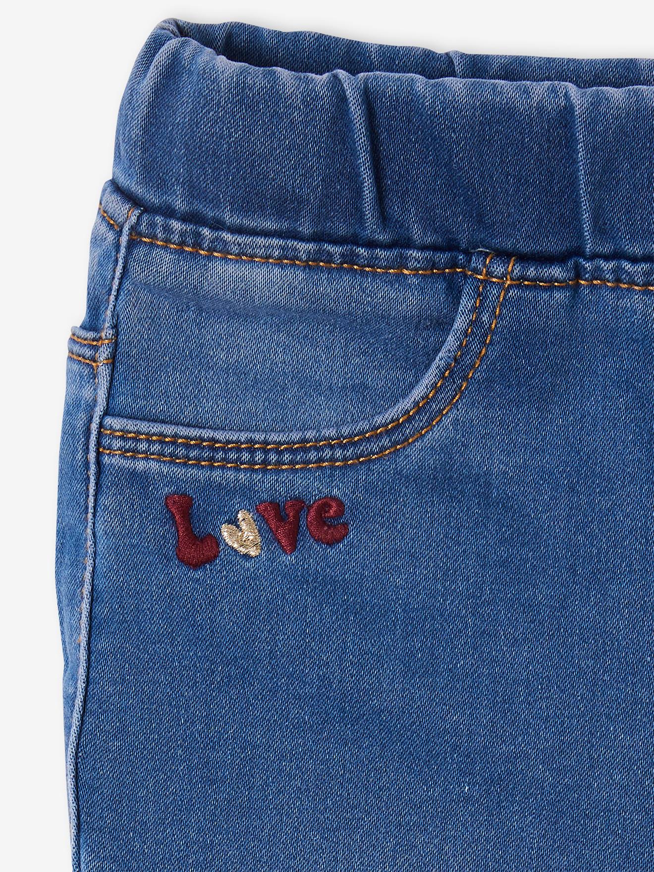 Calça legging feminina em tecido atoalhado bordado com efeito jeans, na cor cinza jeans.