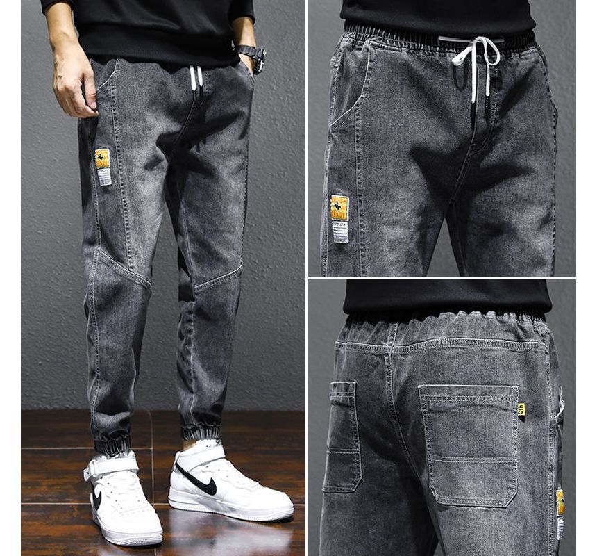 Nikoflin - Jeans met trekkoord en taps toelopende taille en gewassen panelen