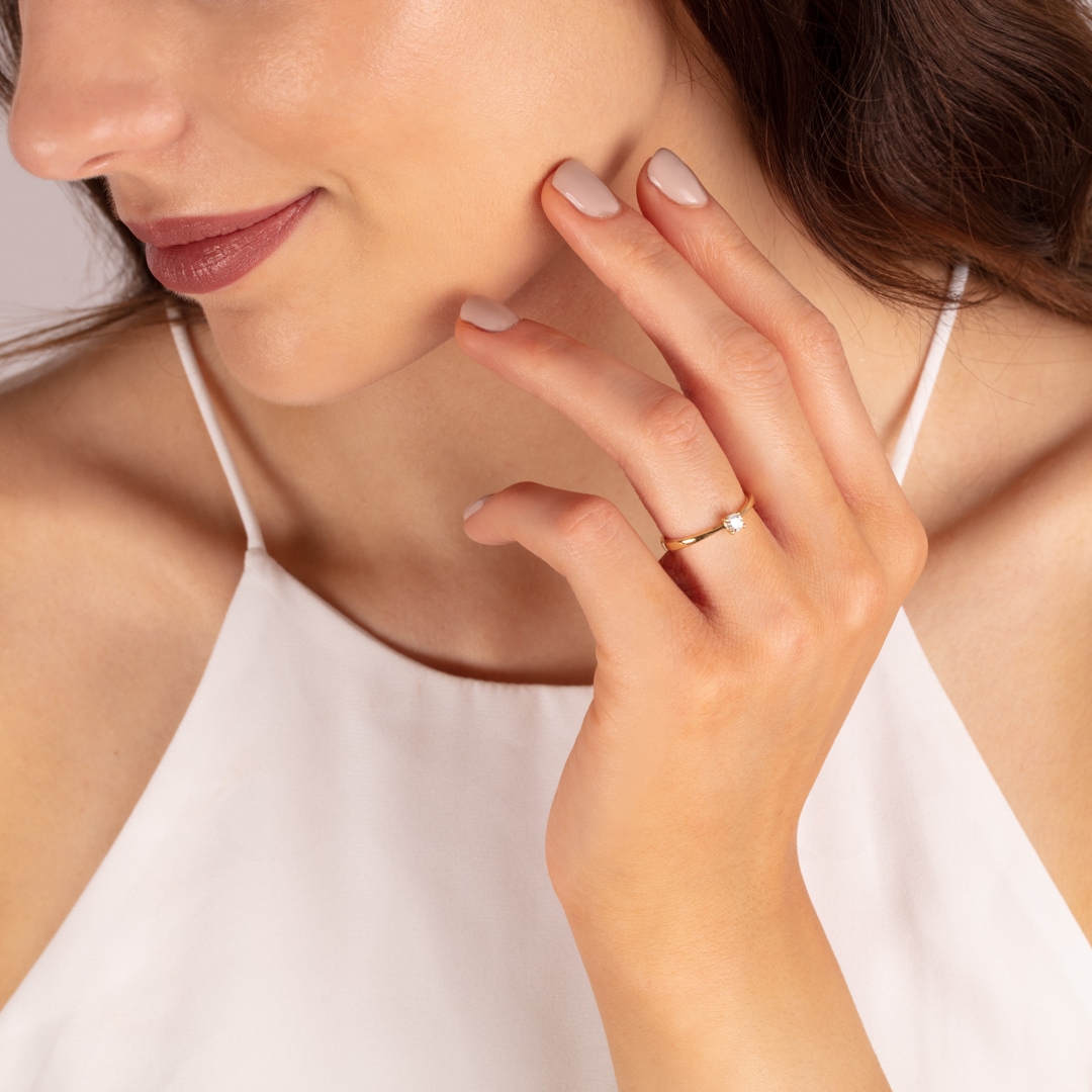 0.15 Karat Diamant Verlobungsring 750/18 K Gelbgold in 4-Griff