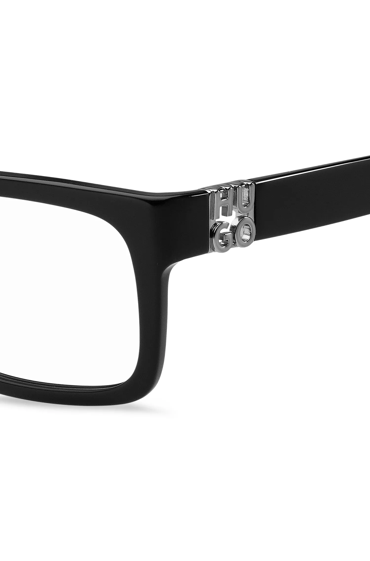 Armação de óculos HUGO em acetato vermelho e preto com monograma 3D.
