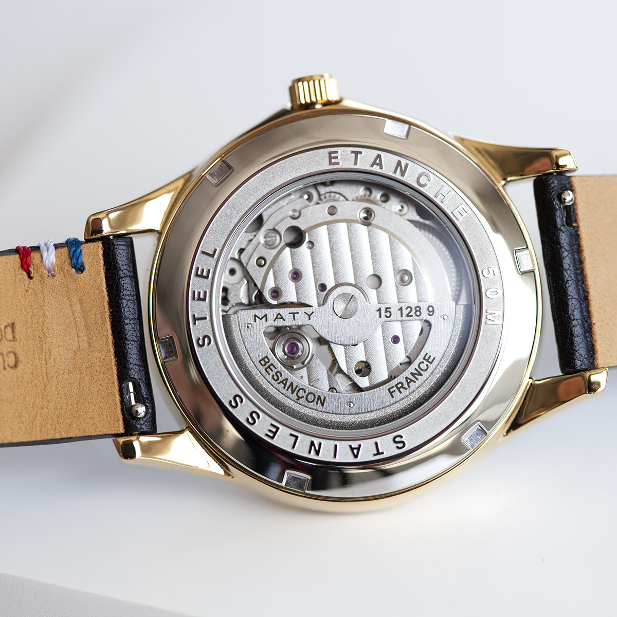 Montre homme coeur ouvert automatique acier doré bracelet cuir noir