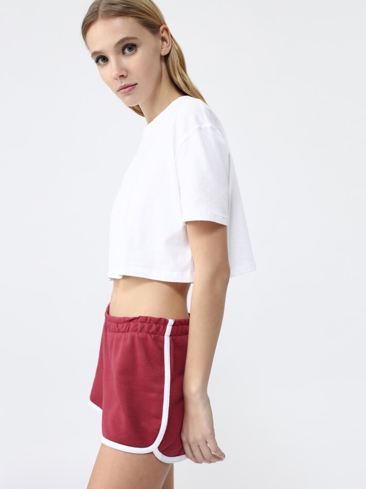 Conjunto de 4 shorts básicos de fleece com detalhes em rosa claro