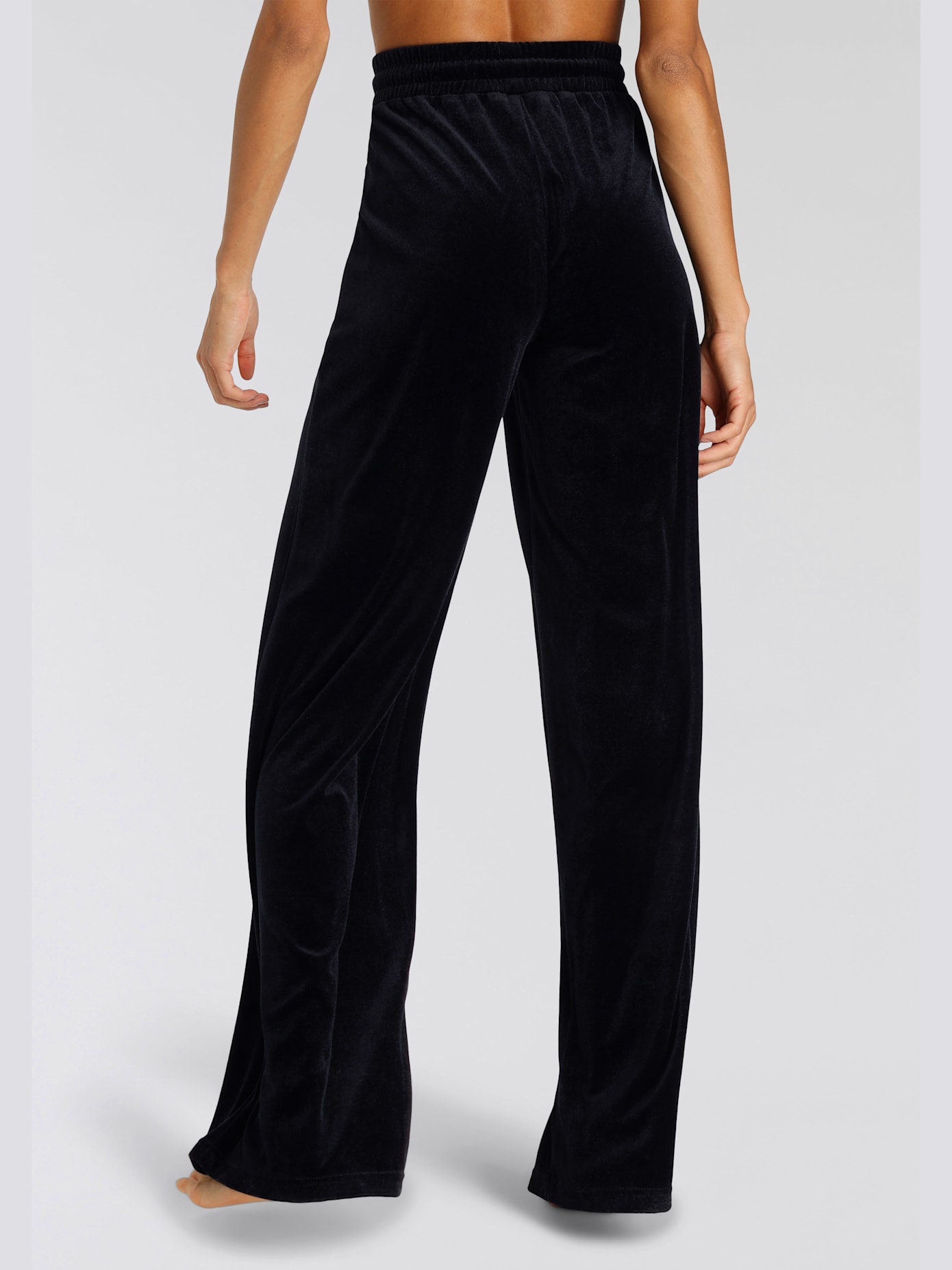 Pantalon en velours ras avec jambes larges