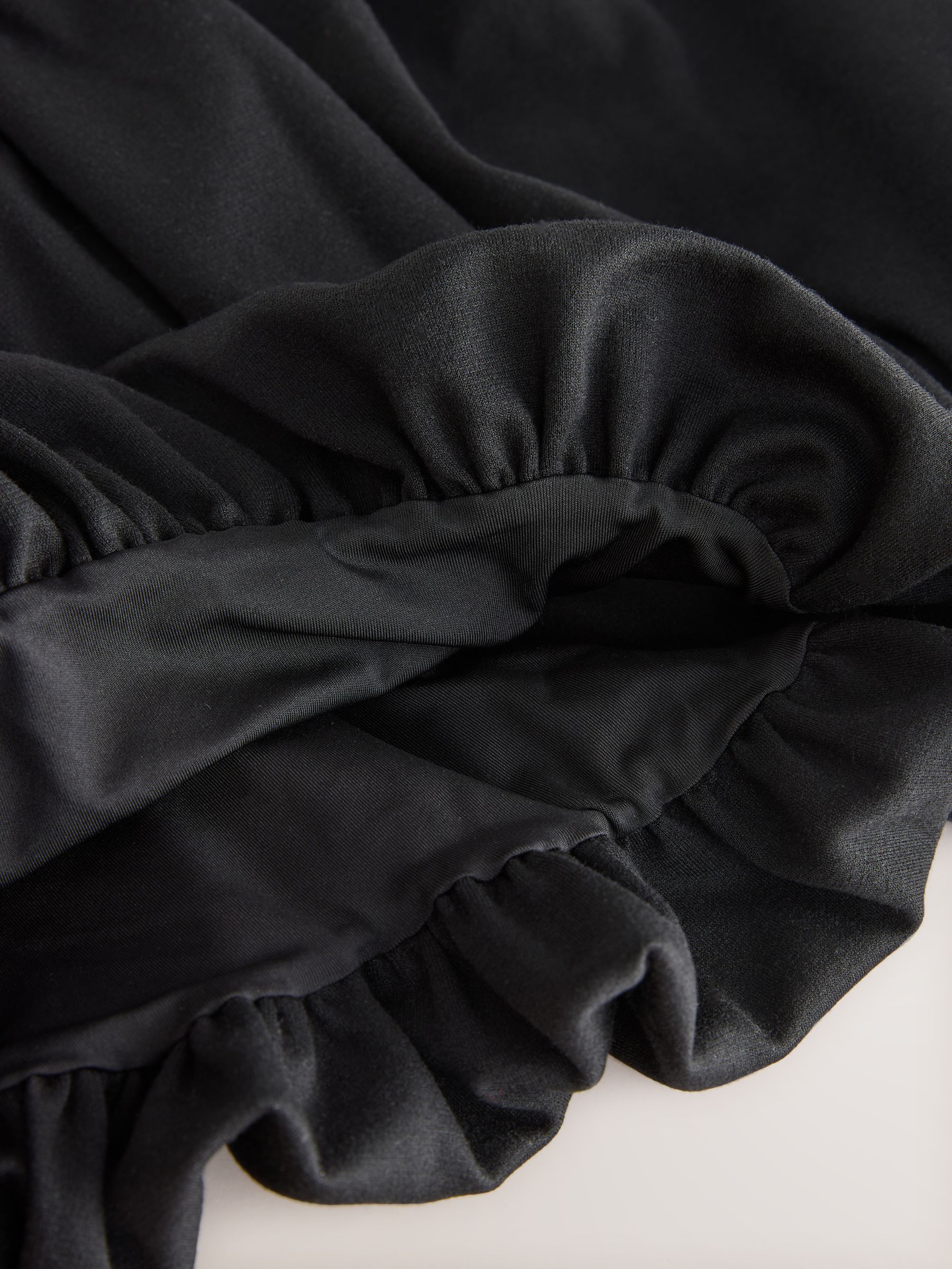 Zwart - Jersey stretch rok met ballonzoom en elastische taille (3-17jr)