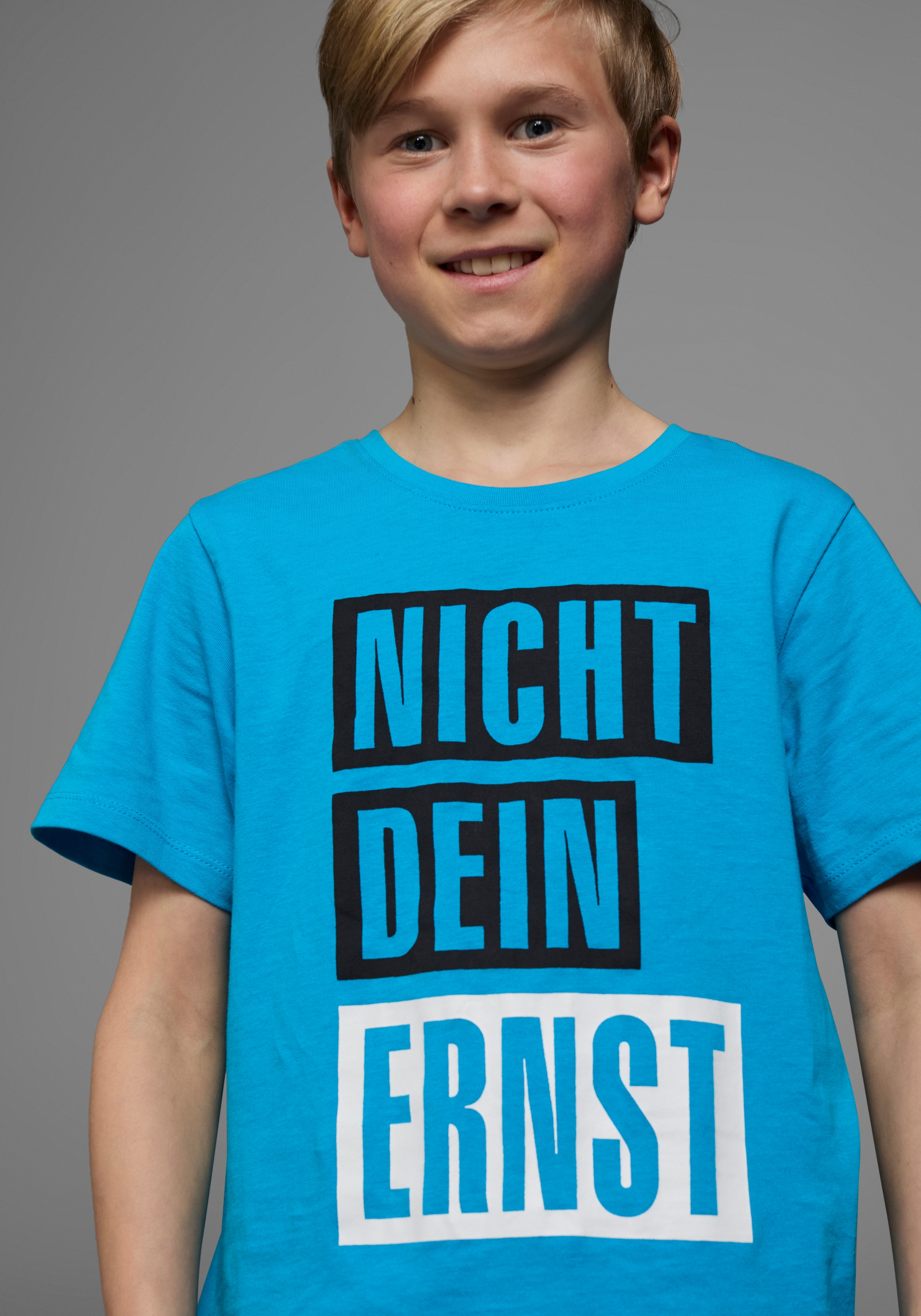 KIDSWORLD T-Shirt »mit Spruch: NICHT DEIN ERNST«, Kurzarm,  Basic-Passform,  mit trendigem Aufdruck