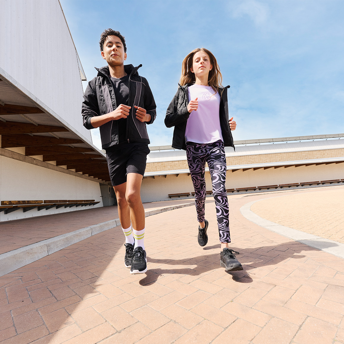 Beatwear Mädchen Sport-Leggings mit Rippstruktur dunkellila / schwarz