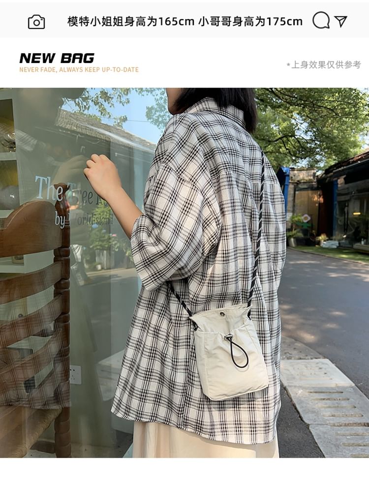 Bolso - Effen nylon crossbodytas met trekkoord