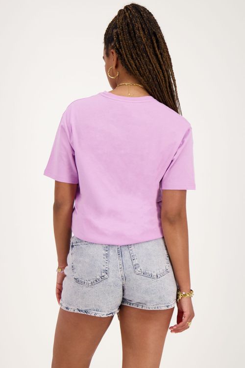 Blauwe denim skort met overslag en roze gloed