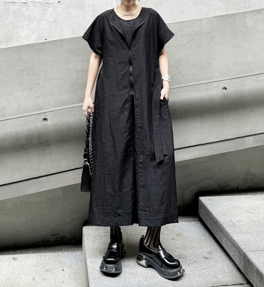 KUMI - Jumpsuit met korte mouwen en wijde pijpen