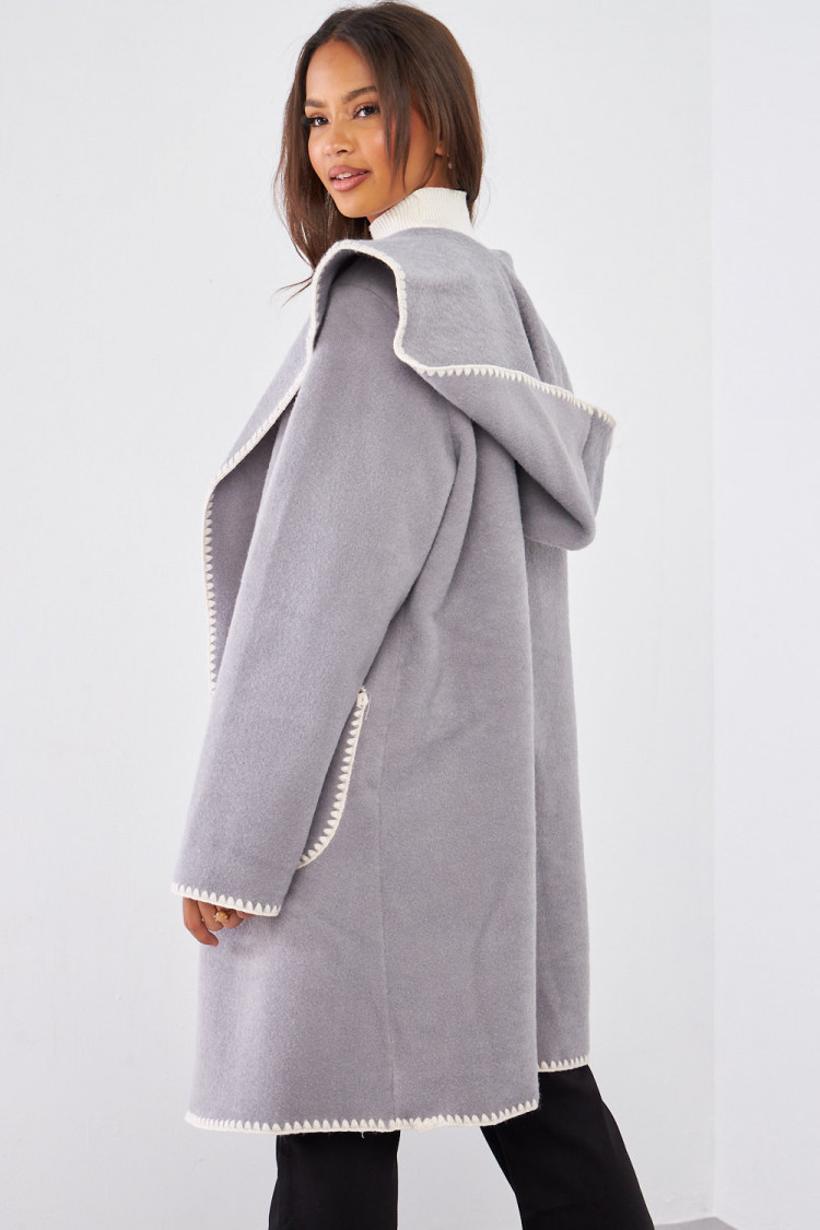 Veste longue à capuche grise texturée à couture en relief
