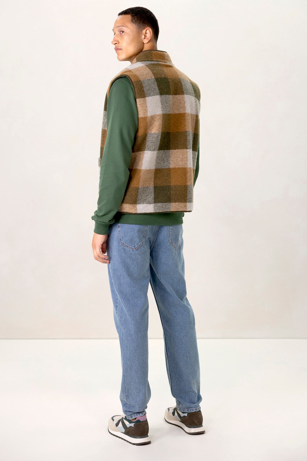 Groen geblokte reversible teddy bodywarmer