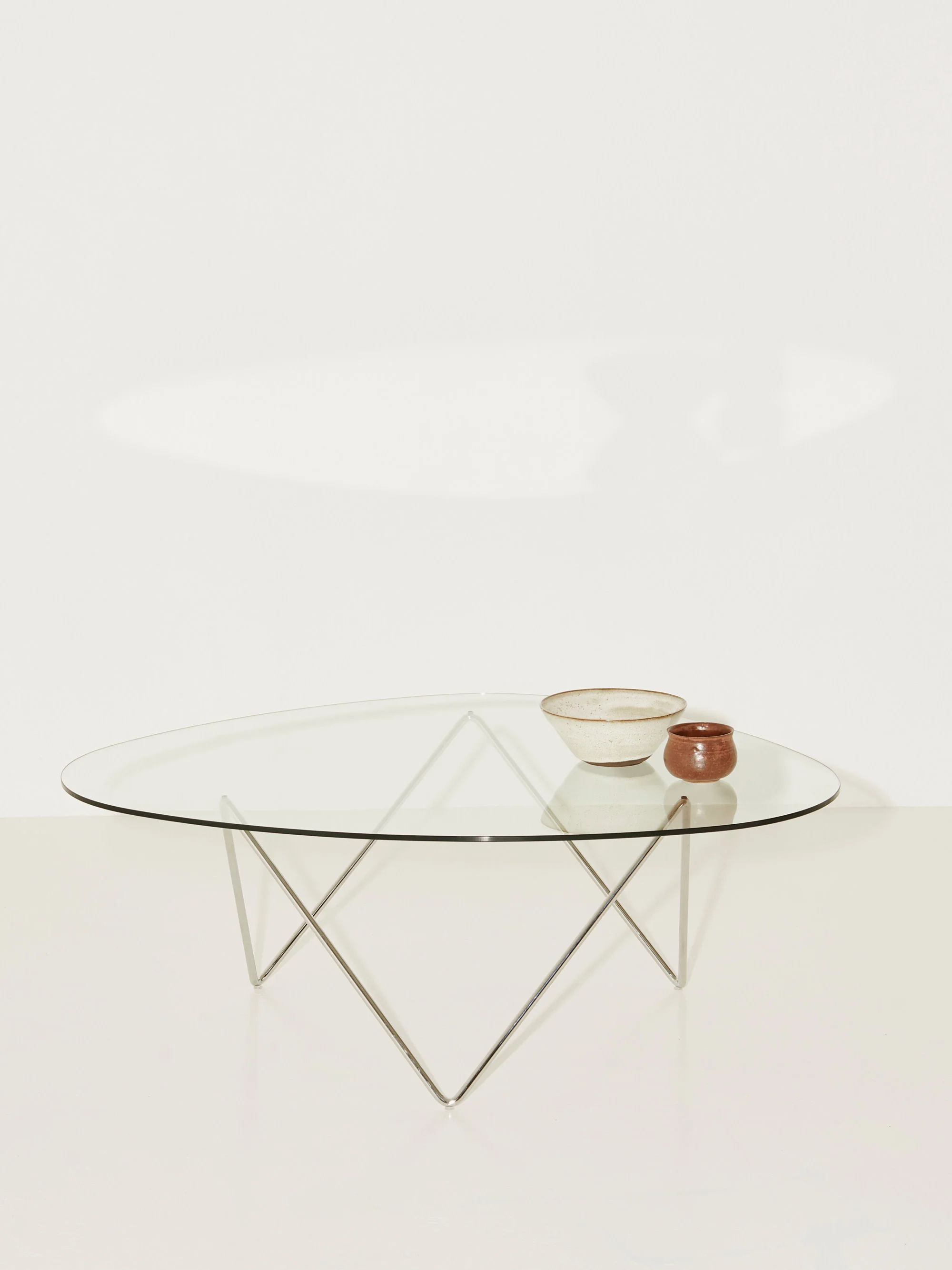 Ovale salontafel Pedrera met glazen tafelblad