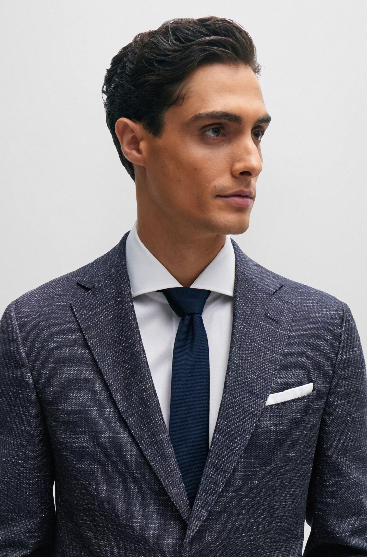 Jaqueta BOSS preta de corte slim em mistura de lã estampada.