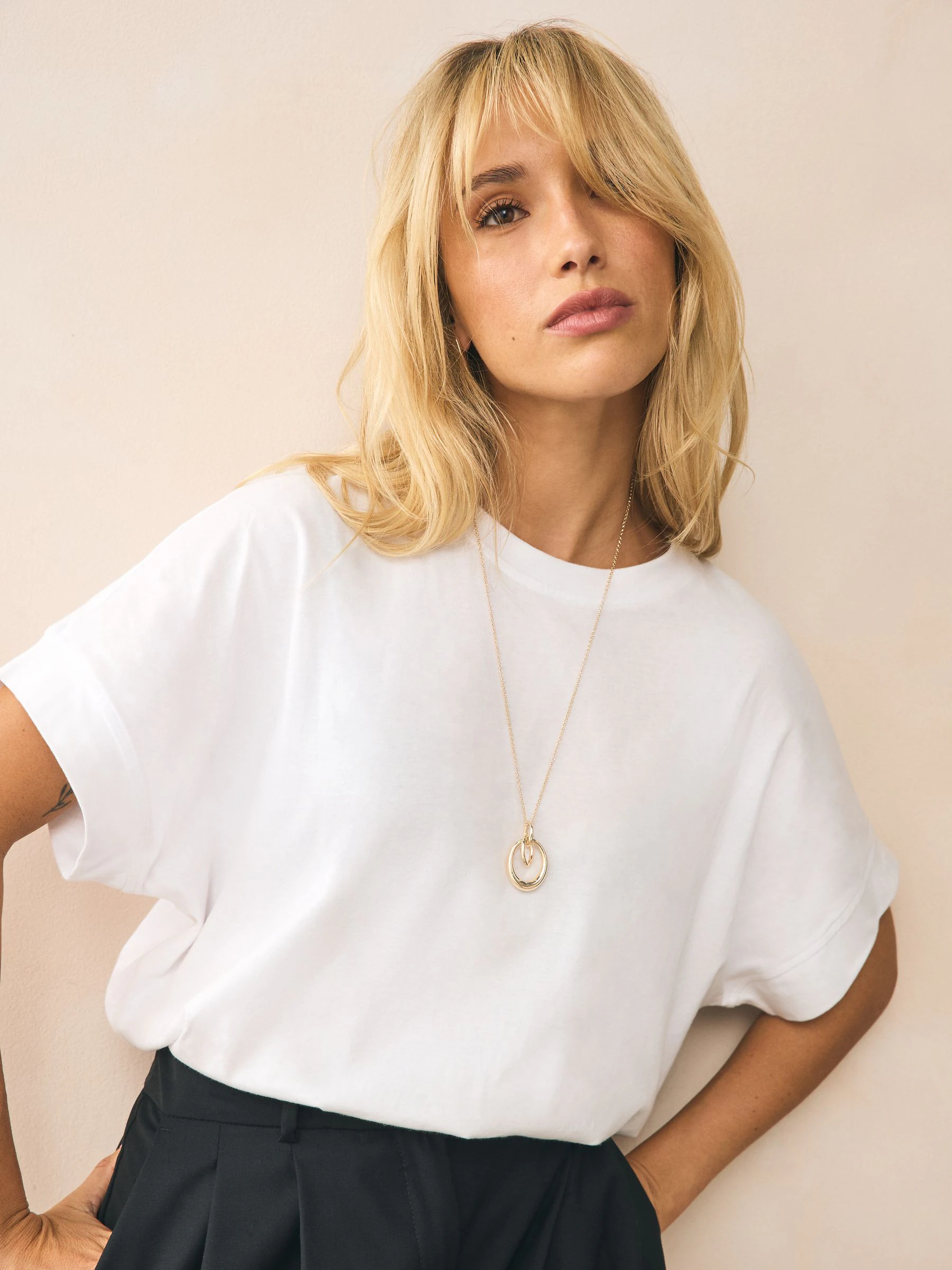 Goudkleurig - Ketting met hangertje van vereende ringen
