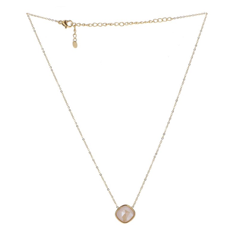 Collier en acier maille dorée orné d'un cristal taillé couleur ivoire avec chaînette réglable