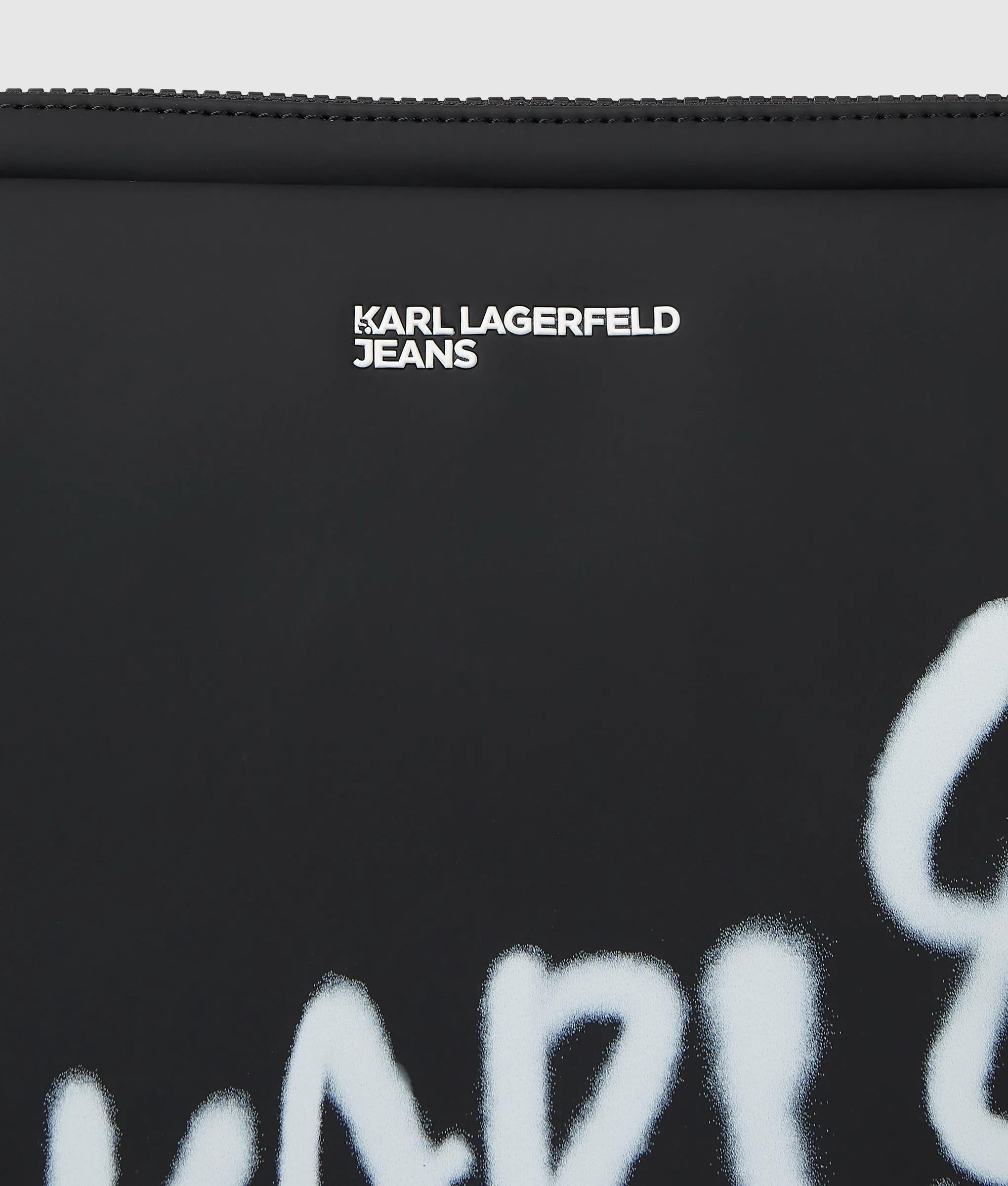 Gecoate kleine laptoptas met Karl-citaat