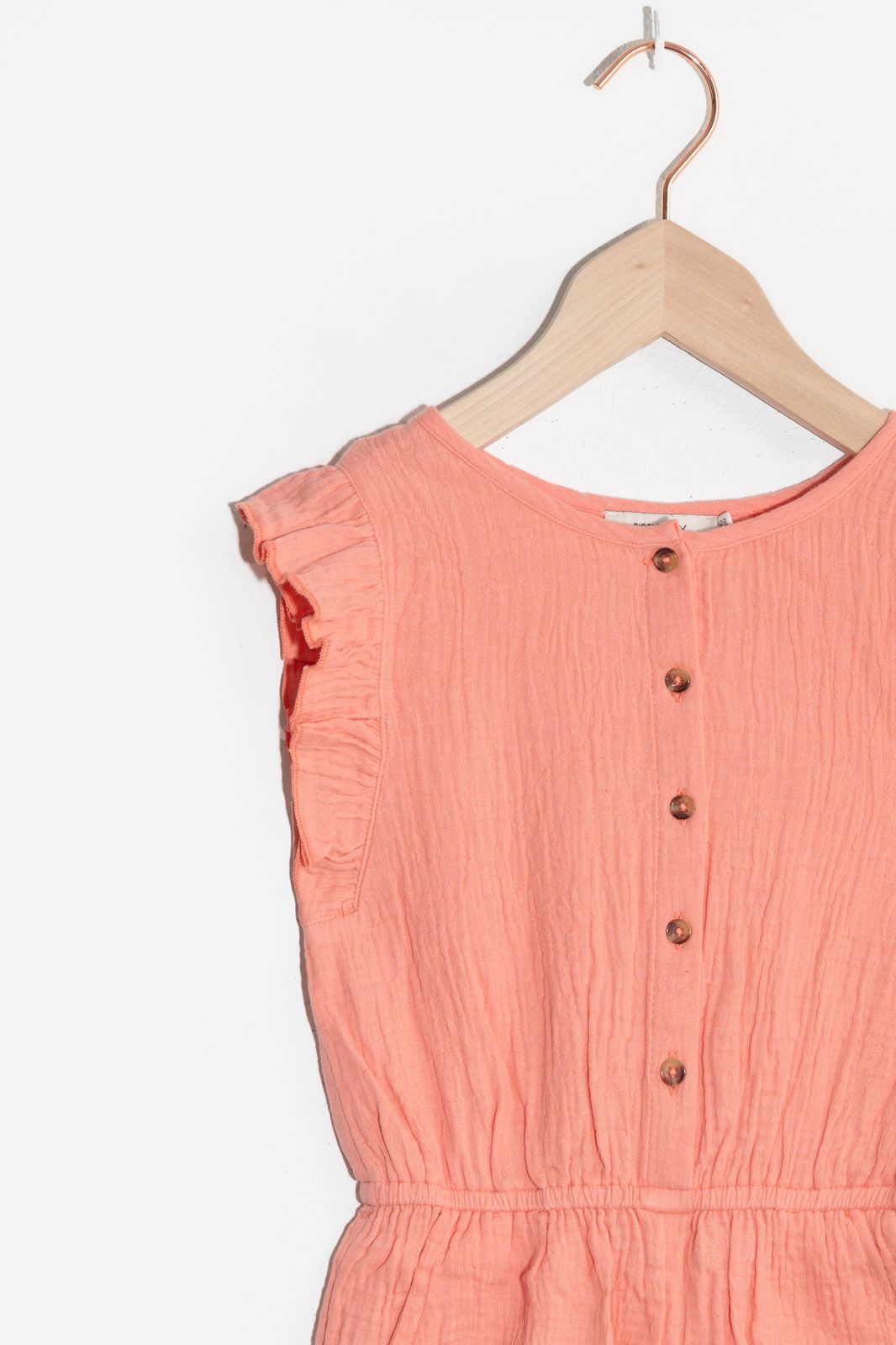 Koraal roze playsuit met ruffles