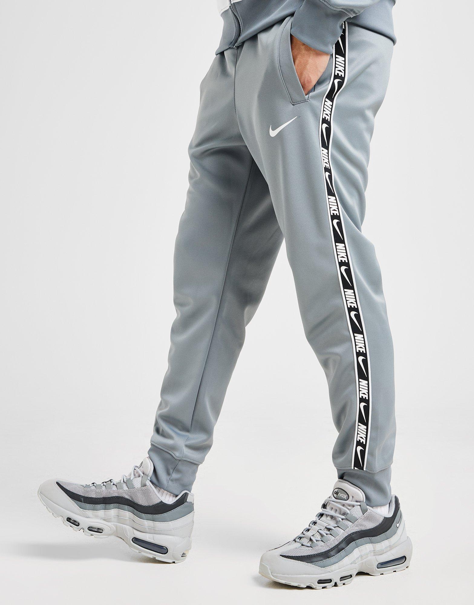Nike Pantalon de survêtement Tape Polyknit