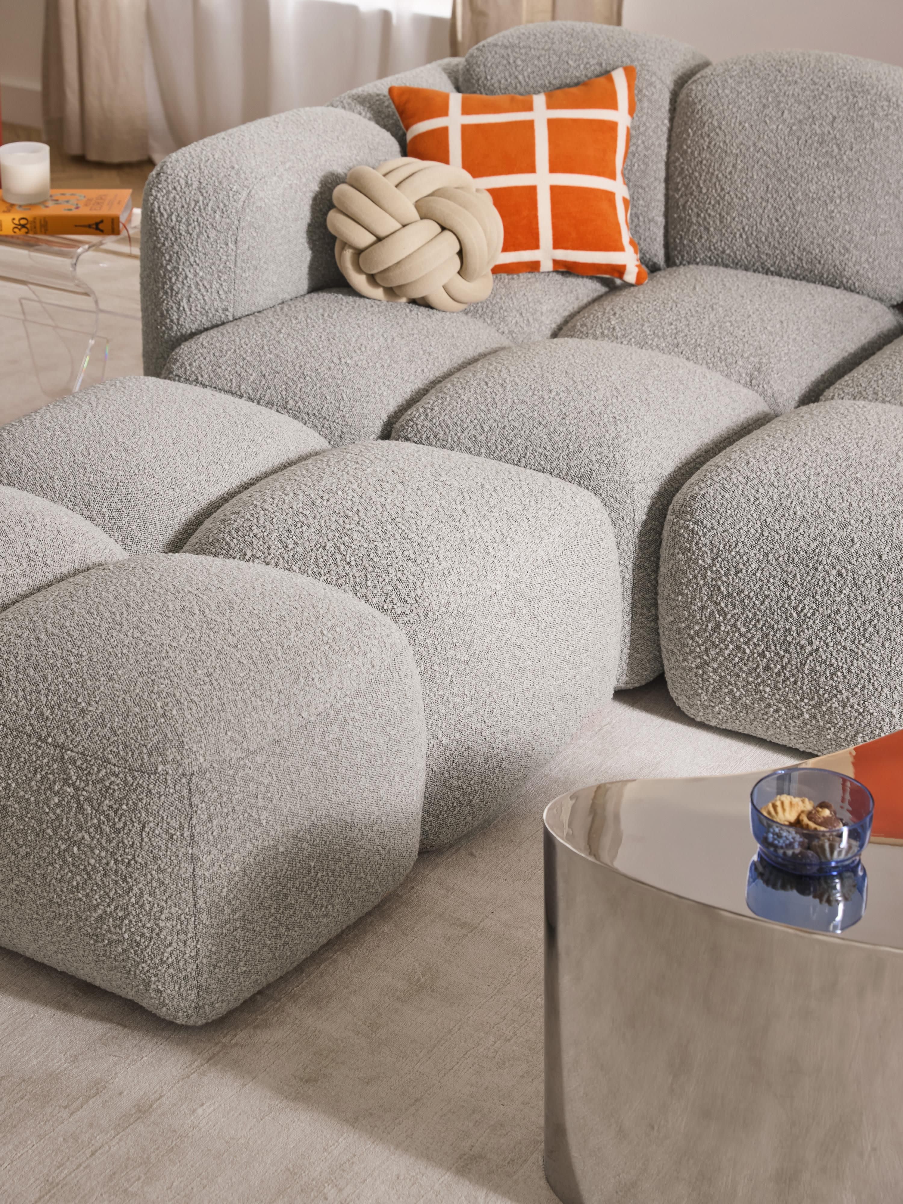 Modulaire bank Tayla (3-zits) van bouclé met poef (links/rechts)