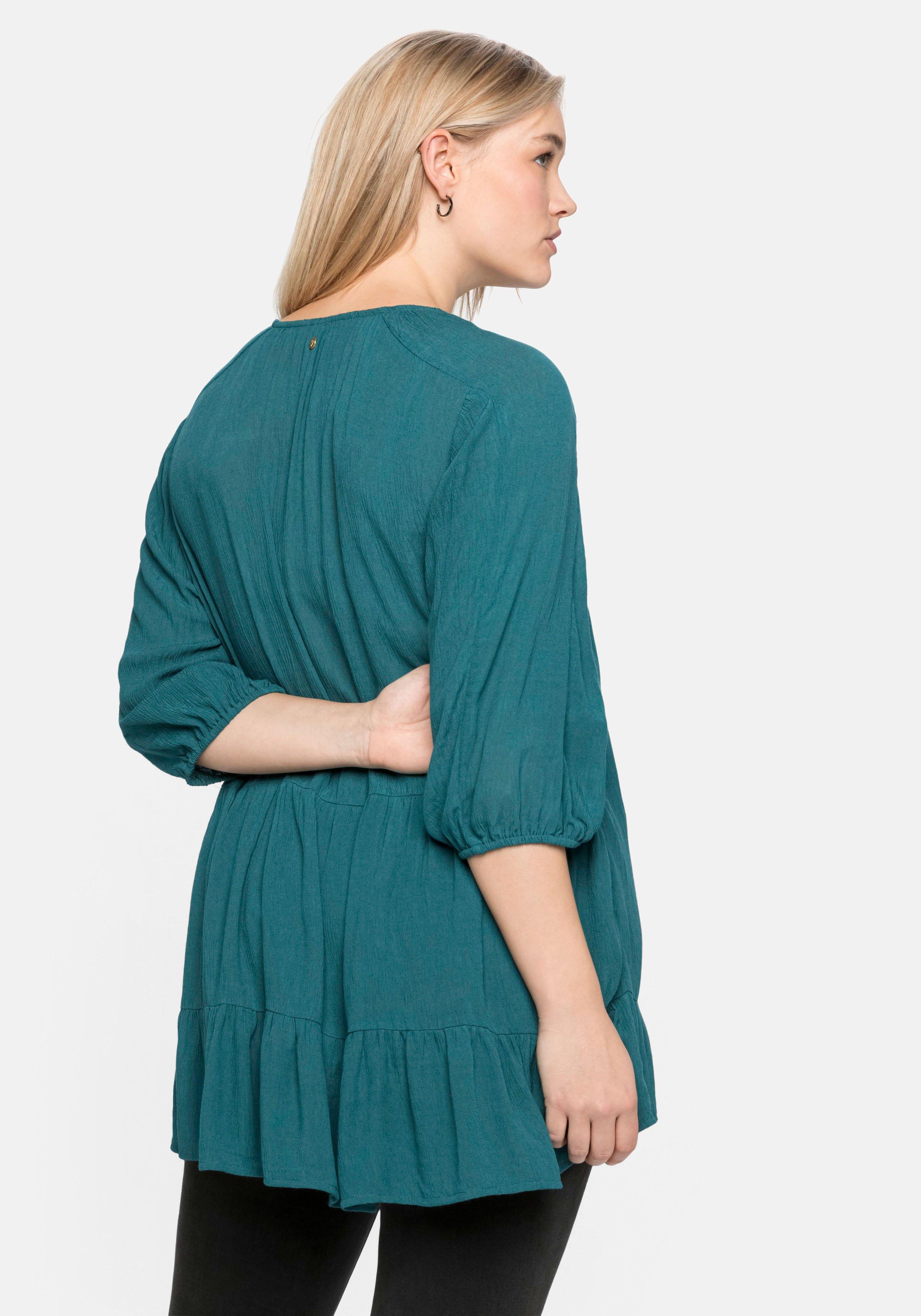 Bluse aus Crêpe, mit Volants am Saum