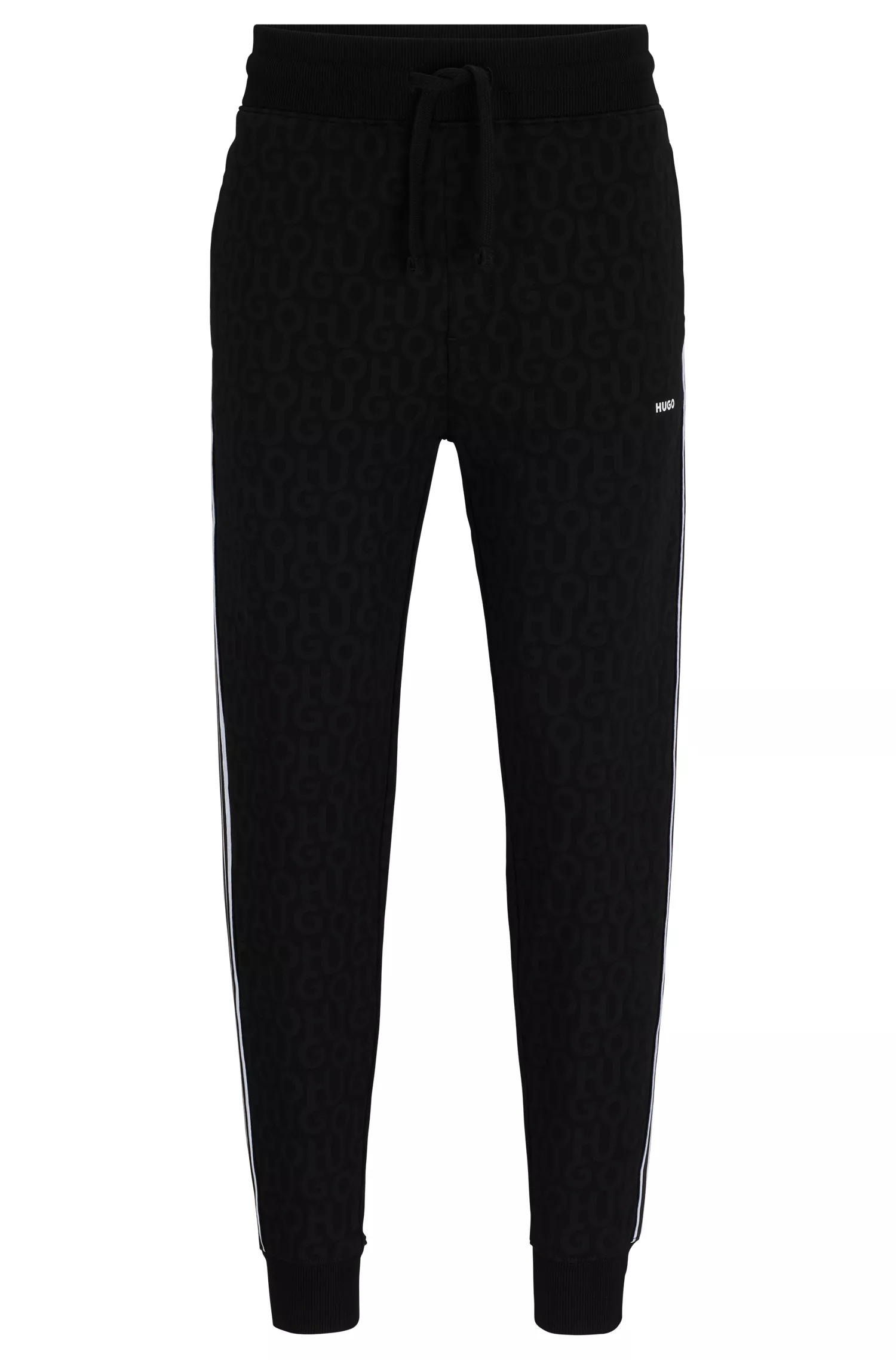 Calça de fato de treino HUGO em tecido atoalhado de algodão vermelho com padrão de rabiscos.