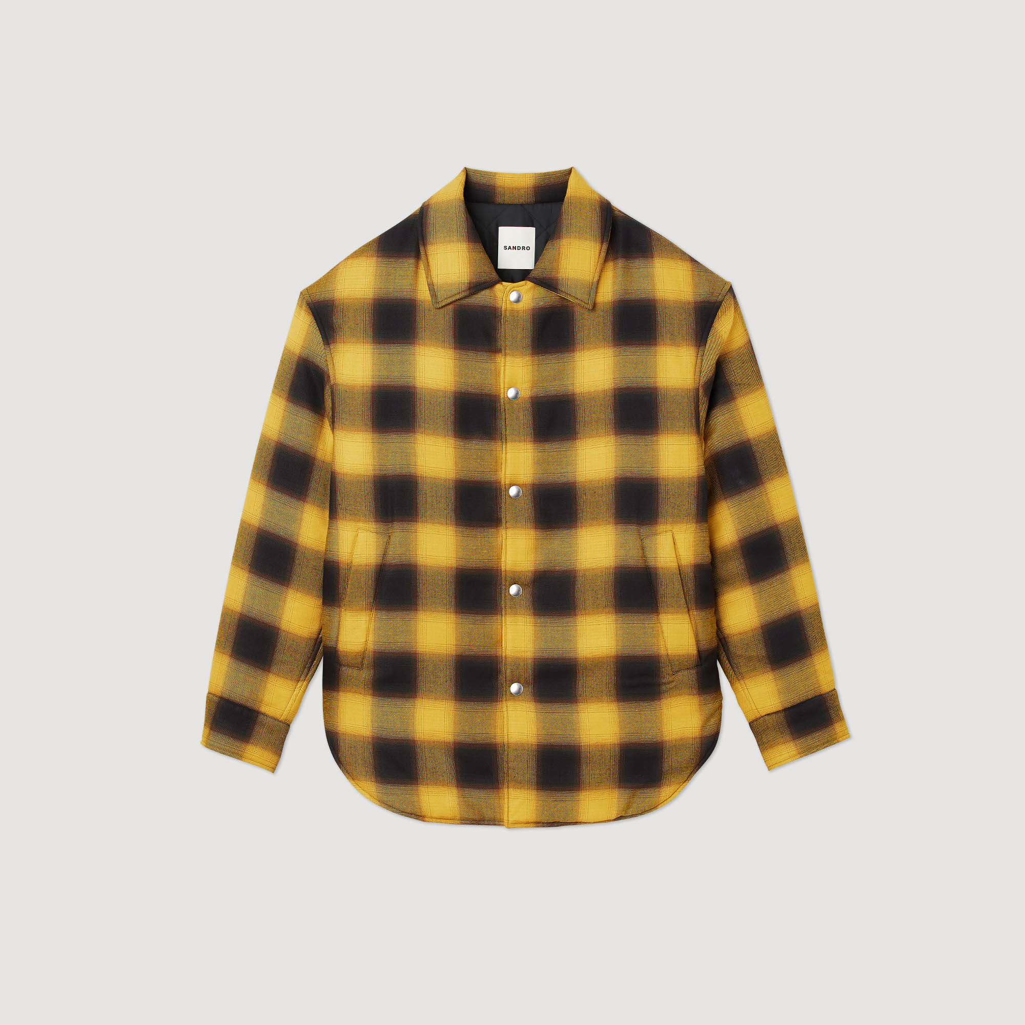 Blouson matelasse á carreaux