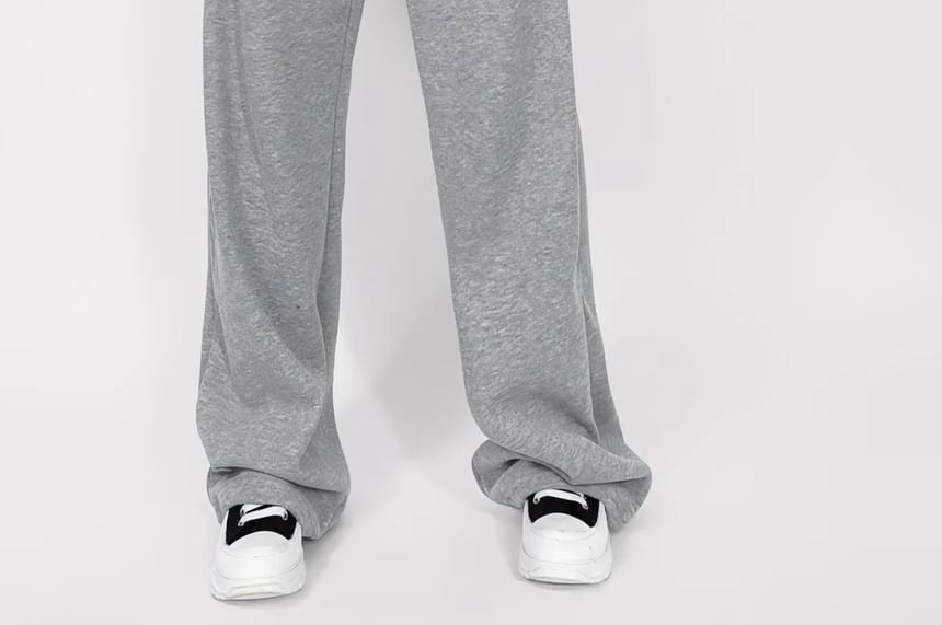 Asiris - Lage, contrasterende, losse joggingbroek met wijde pijpen