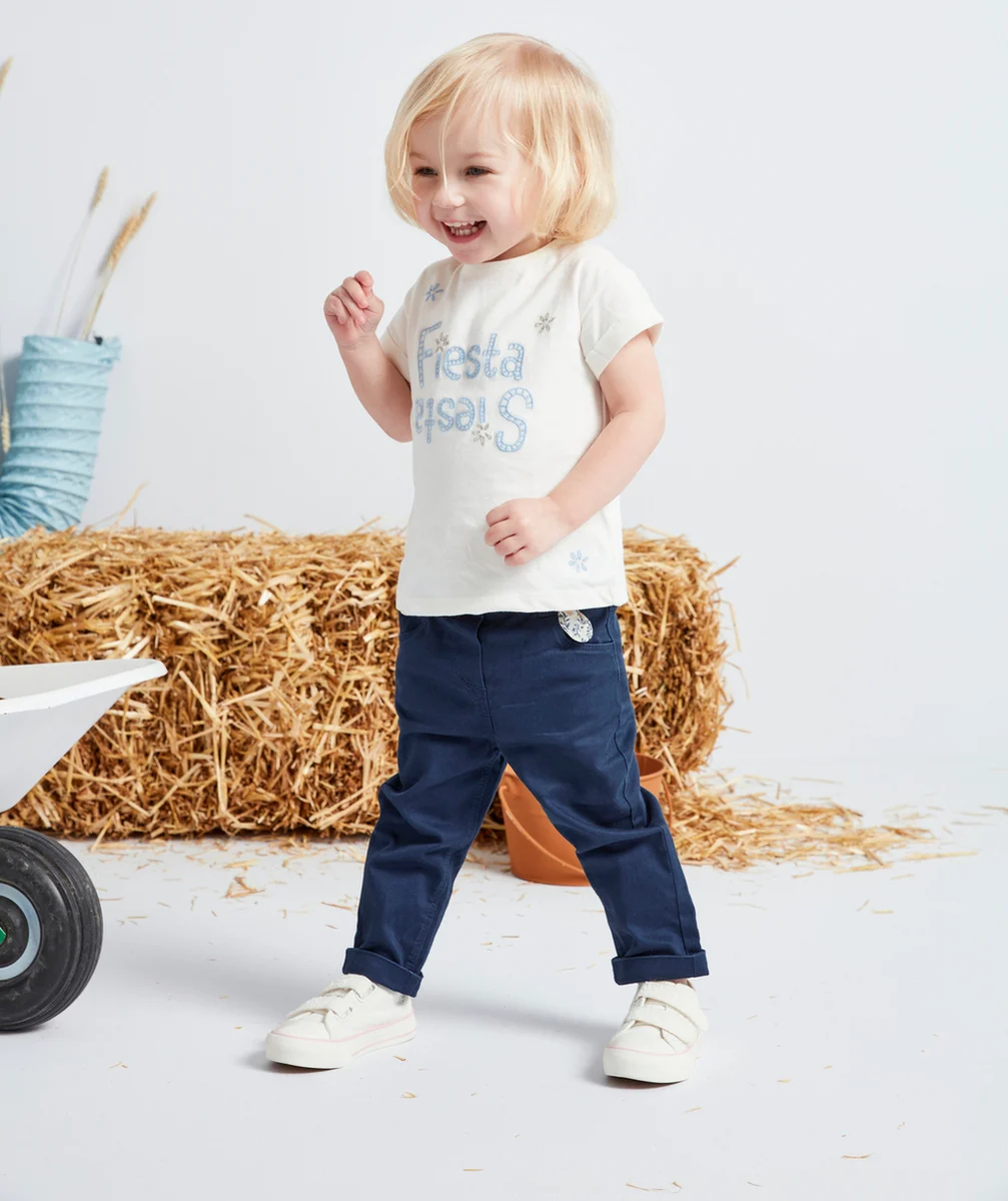 PANTALON SLIM FILLE EN DENIM BLEU MARINE AVEC NOEUD FLEURI