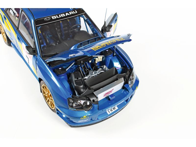 IXO Models Premium Kit Subaru Impreza Rally MC 2003 1:8 Detailgetreuer Standmodellbausatz im Massstab 1:8