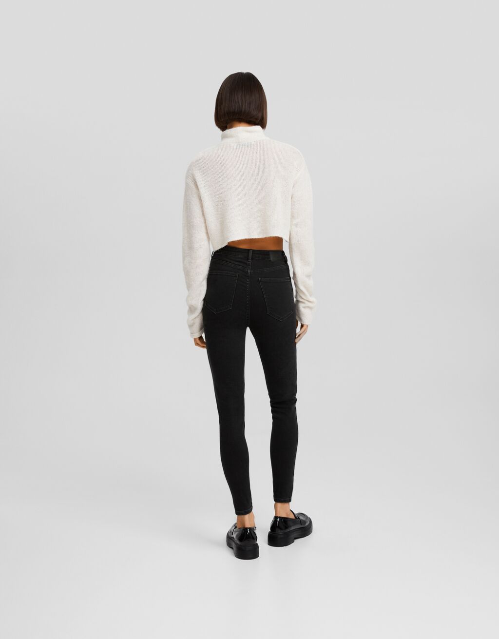 calça jeans skinny de cintura super alta