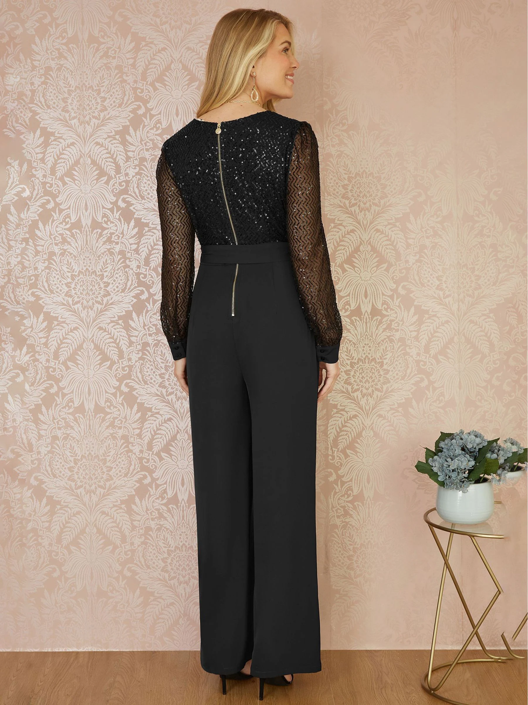 Yumi - Jumpsuit met lovertjes en lange mouwen
