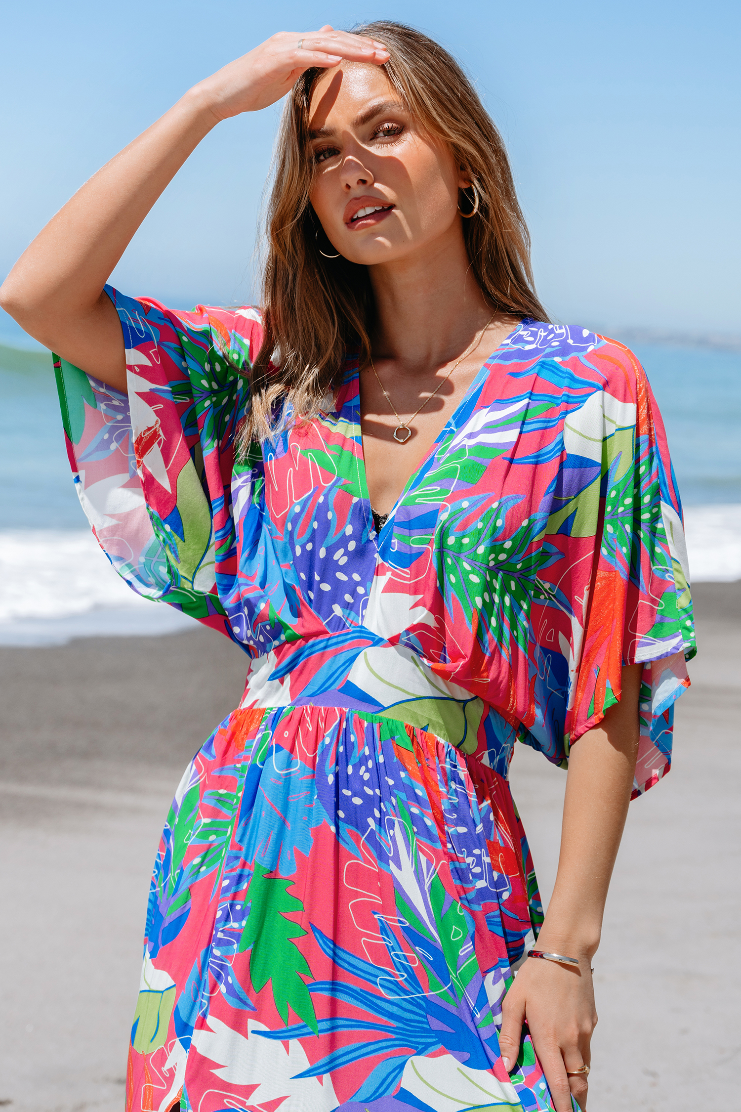 Robe maxi à smocks tropicale brillante