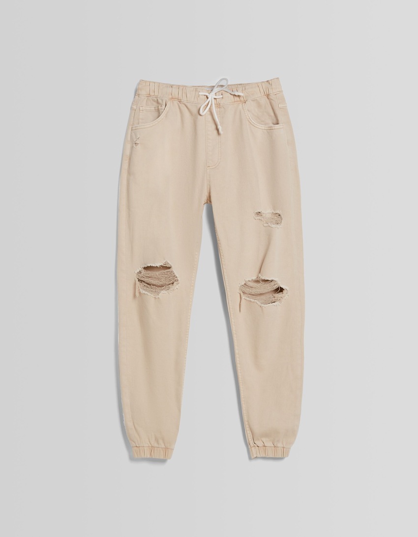 calça jogger rasgada