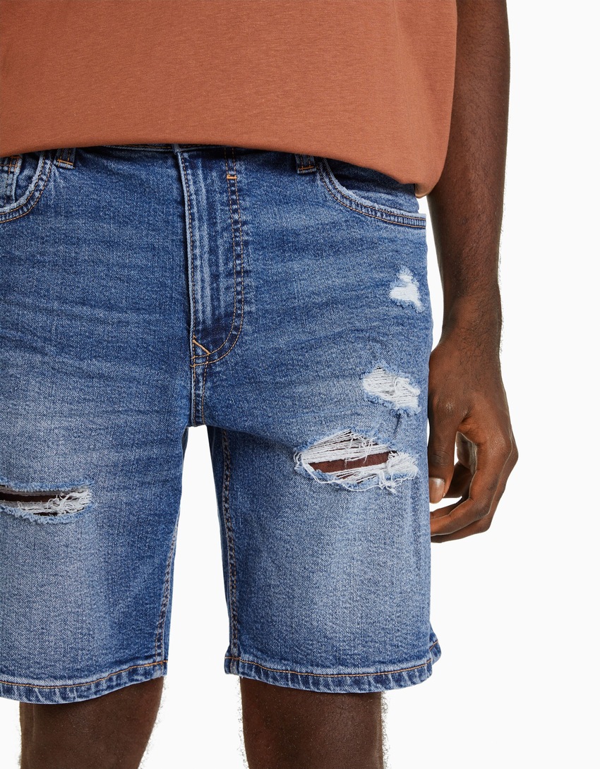 Bermuda jeans rasgada