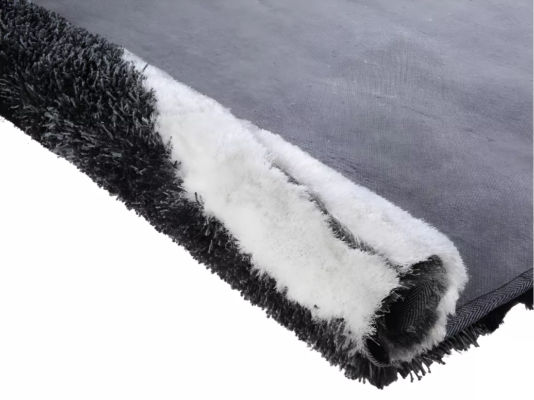 Tapis shaggy à poils longs ECUME - tufté main - Noir et Blanc - 140 x 200 cm