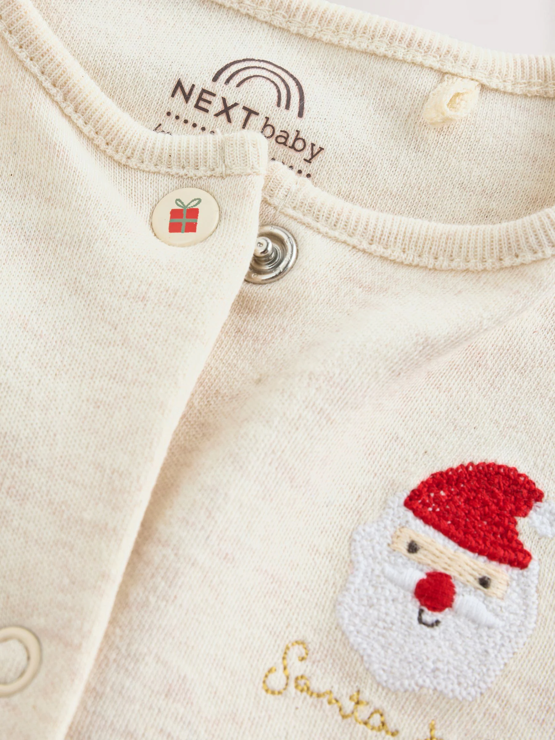 Crème - Kerstbabypyjama met figuurtjes (0mnd-3jr)