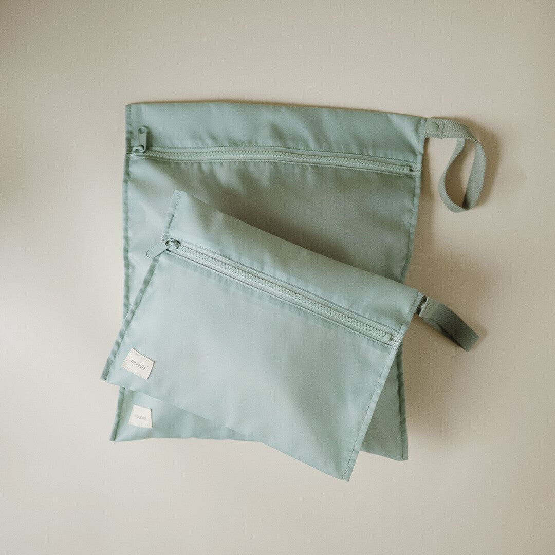 Mushie waterproof opbergzak - roman green