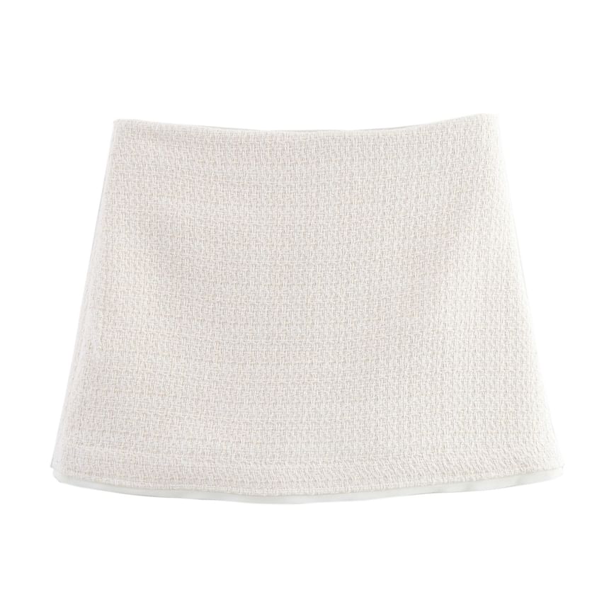 Avauntgardo - Getailleerde tweed cropped jas met kraag en strik / Mini A-lijn skort met hoge taille