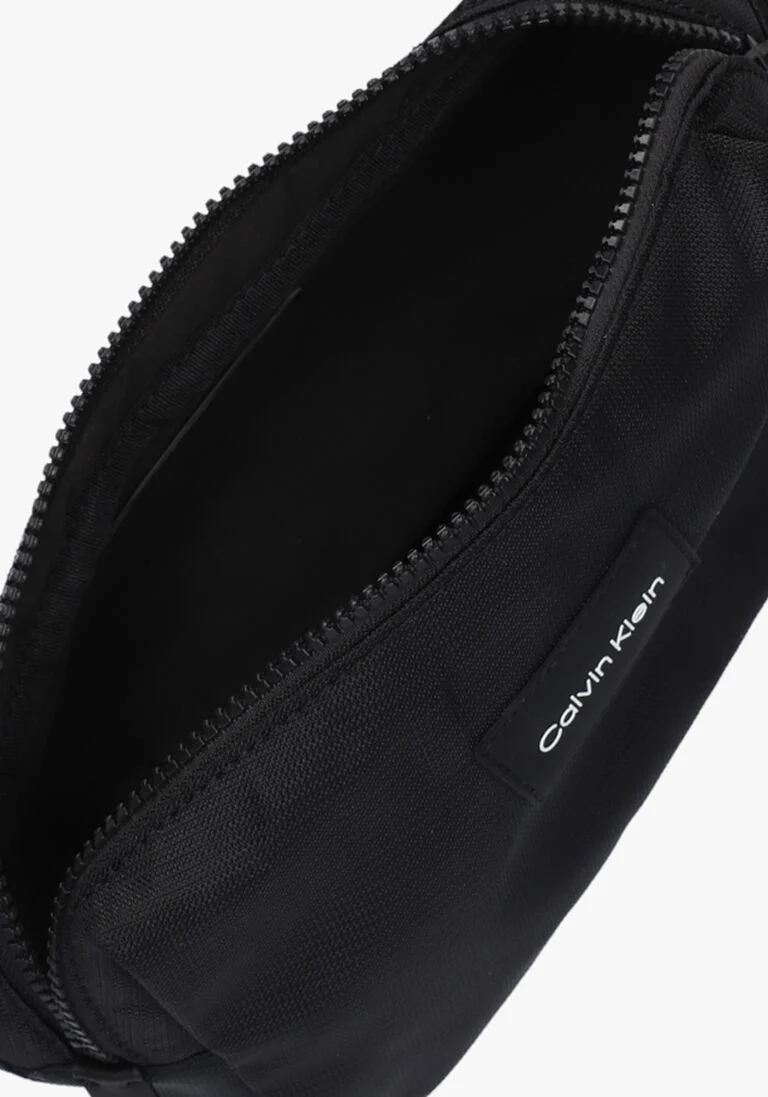 CALVIN KLEIN zwarte calvin klein schoudertas ck must waistbag