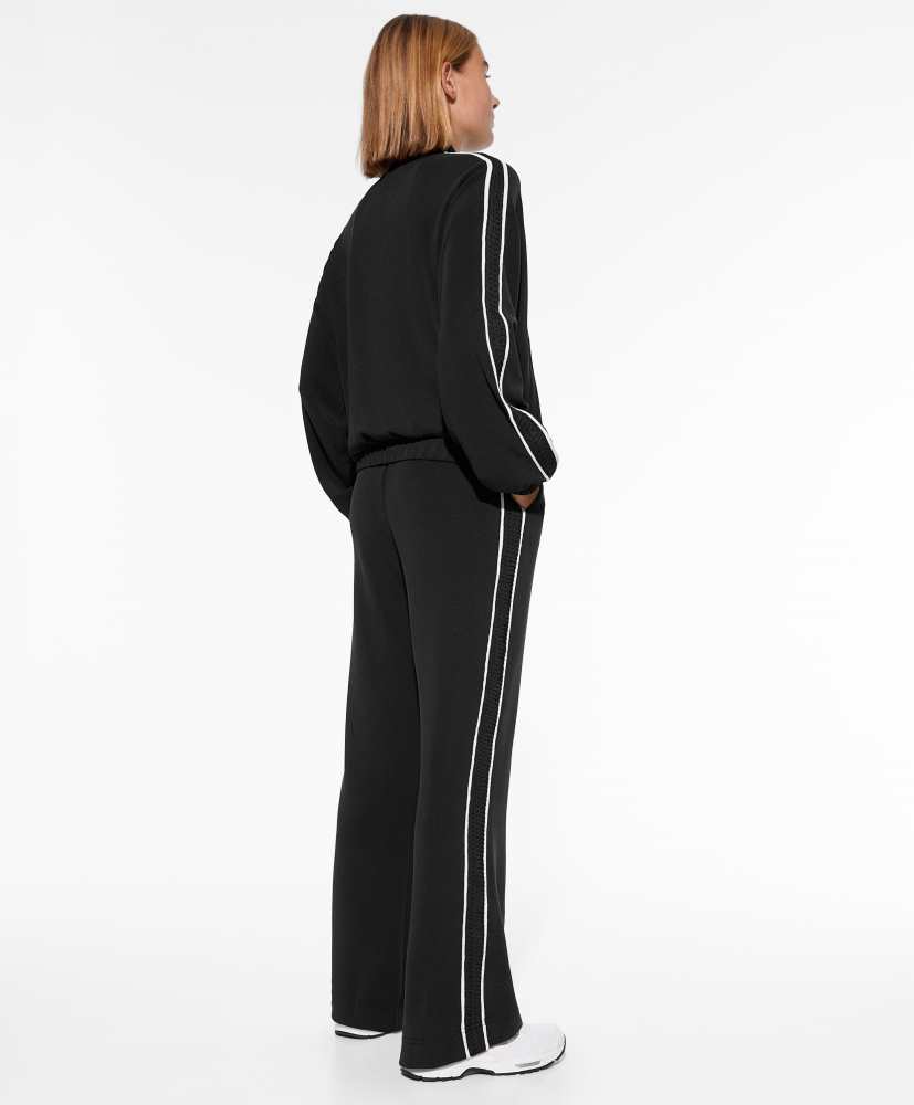 Calça flare em modal com aplique lateral