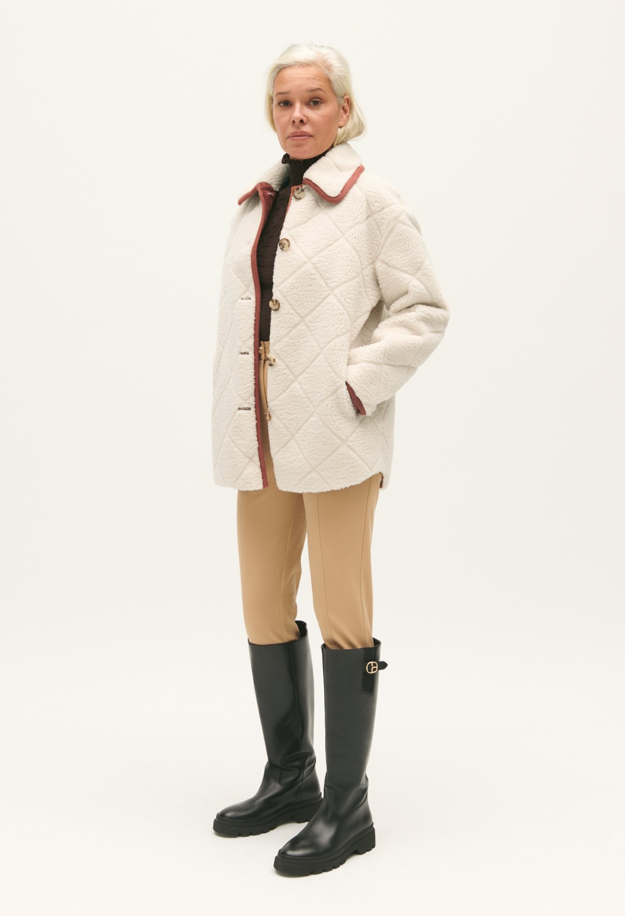 Manteau effet peau lainee