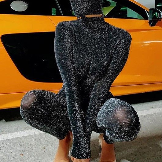 Oonnukal - Glitterjumpsuit met lange mouwen